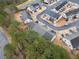 An aerial view of townhomes, trees, and landscape from above at 28 Eagle Glen Ne Dr, Cartersville, GA 30121