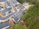 Overhead aerial view of townhomes, mature trees, community pool, and surrounding neighborhood at 28 Eagle Glen Ne Dr, Cartersville, GA 30121