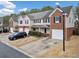 View of exterior elevation of townhomes featuring attached garages and private driveways at 28 Eagle Glen Ne Dr, Cartersville, GA 30121