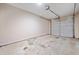 Spacious garage featuring unfinished concrete flooring and a white door at 28 Eagle Glen Ne Dr, Cartersville, GA 30121