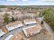 Scenic aerial view of a well-maintained townhome community with lush greenery at 407 Paper Mill Lndg, Roswell, GA 30076