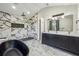 Luxurious bathroom featuring a modern shower, soaking tub, and dual vanity at 56 Ruth Way, Douglasville, GA 30134