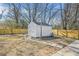 Backyard shed and privacy fence on a level lot perfect for outdoor enjoyment at 897 Marie Lane Sw Ln, Conyers, GA 30094