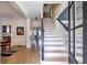 Inviting entryway with hardwood floors, staircase, and bright natural light at 944 Cherokee Se Ave, Atlanta, GA 30315