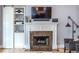 Elegant fireplace with marble surround and custom built-ins, creating a cozy and sophisticated focal point at 944 Cherokee Se Ave, Atlanta, GA 30315