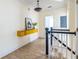 Bright hallway featuring a yellow floating console table and hardwood floors at 944 Cherokee Se Ave, Atlanta, GA 30315