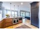 Modern kitchen with stainless steel appliances, a center island, and hardwood floors at 944 Cherokee Se Ave, Atlanta, GA 30315