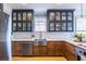 Modern kitchen features stainless steel appliances, farmhouse sink, and glass-front cabinets at 944 Cherokee Se Ave, Atlanta, GA 30315