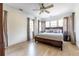 Spacious main bedroom with light-filled windows and a wooden bed frame at 944 Cherokee Se Ave, Atlanta, GA 30315