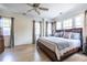 Spacious main bedroom with light-filled windows and a wooden bed frame at 944 Cherokee Se Ave, Atlanta, GA 30315