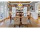 Formal dining room featuring a chandelier, large windows, and hardwood flooring at 15 Northwood Ne Ave, Atlanta, GA 30309