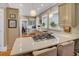 Spacious kitchen with white quartz countertops and seating at the island at 15 Northwood Ne Ave, Atlanta, GA 30309