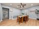 Dining room with hardwood floors featuring a modern table with seating for six at 1707 Terry Mill Se Rd, Atlanta, GA 30316