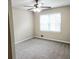 Bedroom featuring neutral walls, carpet flooring, ceiling fan, and natural light at 2724 Hickory Smoke Ct, Snellville, GA 30078