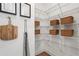 Well-organized pantry with wire shelving and wicker baskets to maximize storage space at 508 Boardwalk Way, Alpharetta, GA 30022