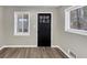 A neutral entryway featuring wood floors and natural light at 847 Magna Carta Nw Dr, Atlanta, GA 30318