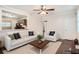 Bright living room with modern furnishings, natural light, and hardwood floors at 1383 Almont Sw Dr, Atlanta, GA 30310