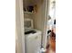 Convenient laundry area with modern washer machine at 9400 Roberts Dr # 6C, Atlanta, GA 30350