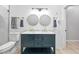 Bathroom featuring a dual sink vanity with framed mirrors and modern fixtures at 966 Ashby Grove Sw St, Atlanta, GA 30314