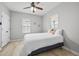 Cozy bedroom featuring hardwood floors, neutral colors and lots of light at 966 Ashby Grove Sw St, Atlanta, GA 30314