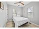 Bright bedroom featuring natural light from two windows and a ceiling fan at 966 Ashby Grove Sw St, Atlanta, GA 30314