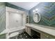 Bathroom with a bathtub, shower, vintage wallpaper, and vanity area at 1 Ansley Ne Dr, Atlanta, GA 30309