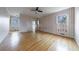 Spacious living room with hardwood floors, neutral walls and lots of natural light at 1 Ansley Ne Dr, Atlanta, GA 30309