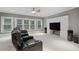 A basement with a media space with a big screen TV and reclining chairs at 2728 Long Grove Dr, Marietta, GA 30062