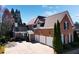 Beautiful brick home with a three-car garage and a well-manicured front yard at 2728 Long Grove Dr, Marietta, GA 30062