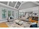 Spacious living room showcases the open concept layout, seamless connection to dining and kitchen, bathed in natural light at 2728 Long Grove Dr, Marietta, GA 30062