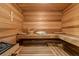 Beautiful home sauna features wood-paneled walls, built-in benches, and traditional sauna accessories at 2728 Long Grove Dr, Marietta, GA 30062
