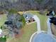 Beautifully landscaped home nestled in a tranquil neighborhood, offering privacy and a sense of community at 30 Barbara Ct, Fayetteville, GA 30215