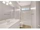 A full bathroom with a shower/tub combo, a modern vanity, and neutral paint at 30 Barbara Ct, Fayetteville, GA 30215