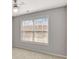Bedroom with a ceiling fan and a bright window overlooking the backyard at 30 Barbara Ct, Fayetteville, GA 30215