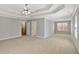 This bedroom has neutral carpet, paint, and trim at 30 Barbara Ct, Fayetteville, GA 30215