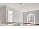 Upstairs hallway with view of downstairs and large arched window at 30 Barbara Ct, Fayetteville, GA 30215