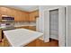 View of a kitchen featuring stainless appliances, wooden cabinets, and a pantry at 30 Barbara Ct, Fayetteville, GA 30215