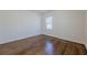 A well-lit empty bedroom with hardwood floors at 3095 Wills Se St, Smyrna, GA 30080