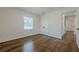 A well-lit empty bedroom with hardwood floors and a closet at 3095 Wills Se St, Smyrna, GA 30080