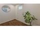 Charming foyer with hardwood floors, decorative mirror, and an inviting plant at 3095 Wills Se St, Smyrna, GA 30080