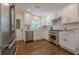 Stylish kitchen with stainless steel appliances, white cabinets, and a modern marble backsplash at 3095 Wills Se St, Smyrna, GA 30080