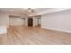 Finished basement with recessed lighting, neutral walls, ceiling fan, and wood-look flooring offer a versatile area at 3621 Sutters Pond Way, Kennesaw, GA 30152