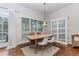 Bright dining area with large windows and modern decor at 3621 Sutters Pond Way, Kennesaw, GA 30152