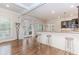 Open kitchen area with breakfast bar and access to outdoor patio at 3621 Sutters Pond Way, Kennesaw, GA 30152