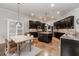 Gourmet kitchen with granite counters, island, and stainless steel appliances at 3621 Sutters Pond Way, Kennesaw, GA 30152