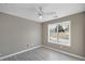 Cozy bedroom with large window and soothing neutral color palette at 414 Shadetree Ln, Lawrenceville, GA 30044