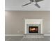 Cozy living room featuring a classic fireplace, providing a focal point for relaxation at 414 Shadetree Ln, Lawrenceville, GA 30044