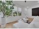 Inviting living room boasting hardwood floors, a comfortable white sofa, and ample natural light from large windows at 875 Center Hill Nw Ave, Atlanta, GA 30318