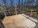 Outdoor back deck with railing and expansive views at 1734 Victoria Nw Way, Kennesaw, GA 30152