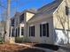 Stunning home features a 2-car garage, complementary siding and paint, and a manicured front yard at 1734 Victoria Nw Way, Kennesaw, GA 30152